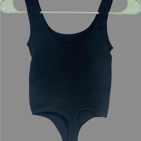Colsie Tops - Colsie Black Ribbed Bodysuit size XS